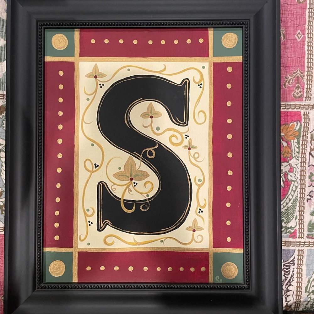 Framed S artwork. Gold burgundy and green